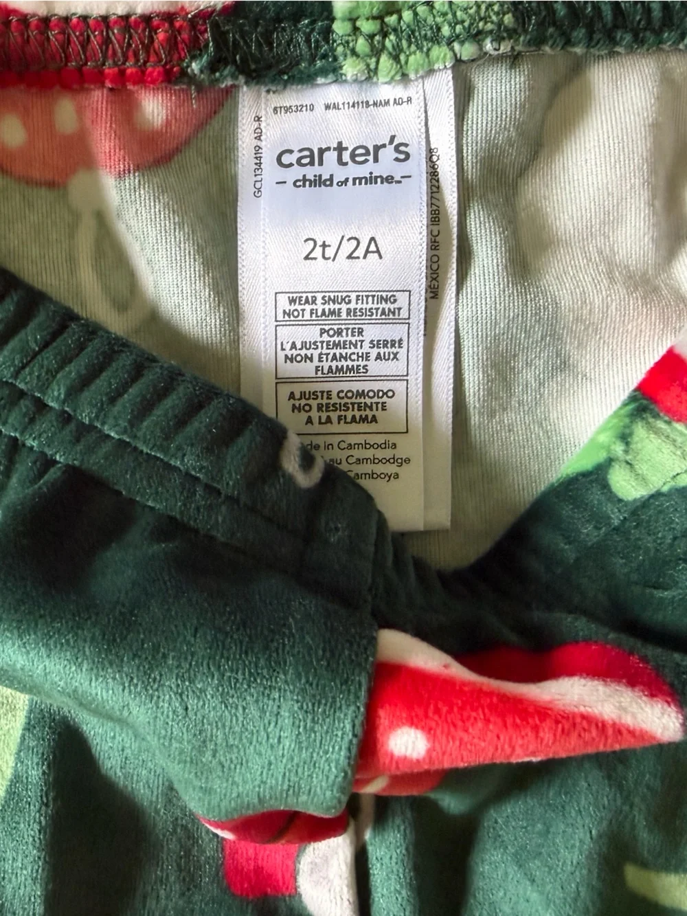 Carter's Green Holiday Pajama Set with Santa, Car & Candy Cane Motifs